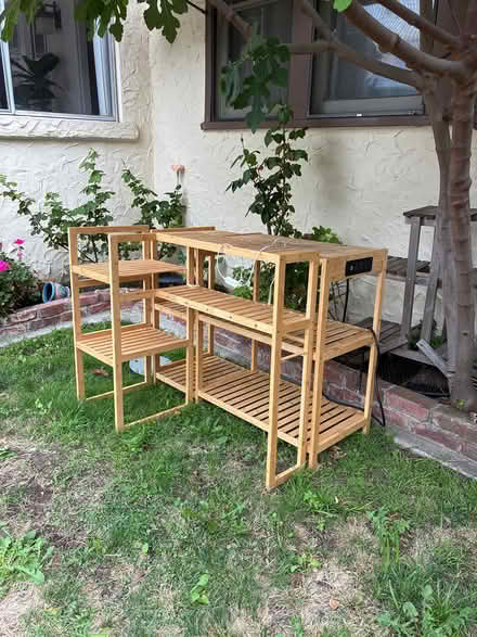 Photo of free Three wooden shelf used for (View st and Dana.) #2