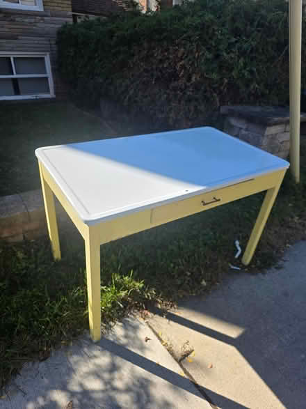 Photo of free 48"-27" Stainless steel table (Near eglinton west station) #1