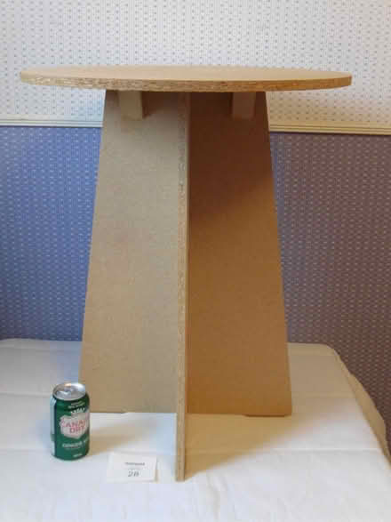 Photo of free round particle board table (Yonge & Mulock) #1