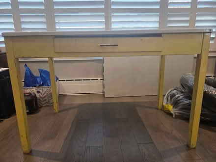 Photo of free 48"-27" Stainless steel table (Near eglinton west station) #2