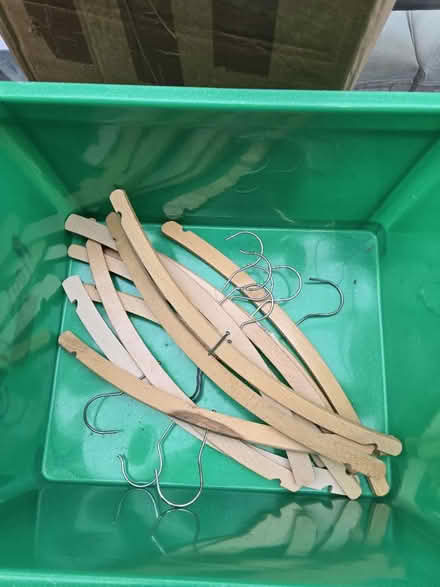 Photo of free 11 wooden coat hangers (SW15) #1