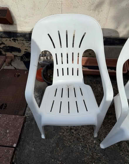 Photo of free Three white plastic garden chairs (Southminster CM0) #2