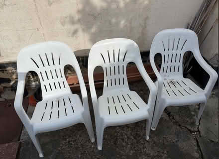 Photo of free Three white plastic garden chairs (Southminster CM0) #1