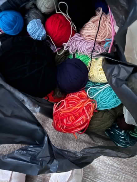 Photo of free Black bin ball full of wool (Ash vale) #1