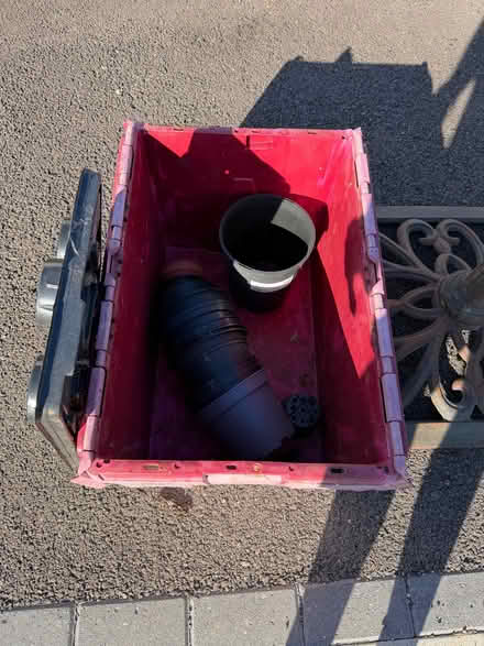 Photo of free Black Plastic Bin, Cast Iron Parasol Base, Plastic Plant Pot (Wokingham RG40) #3