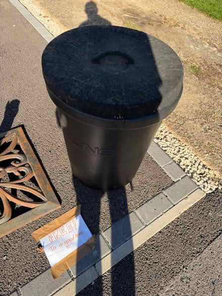 Photo of free Black Plastic Bin, Cast Iron Parasol Base, Plastic Plant Pot (Wokingham RG40) #1
