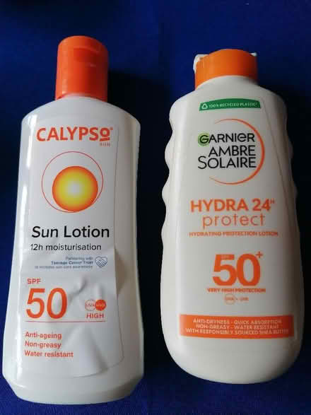 Photo of free 2 part used bottles of sun tan lotion (Presteigne LD8) #1