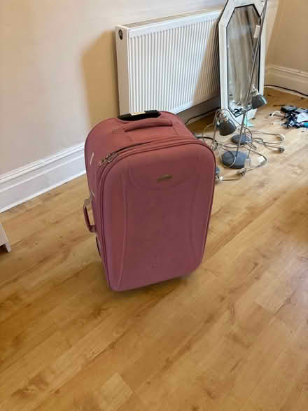 Photo of free Large Suitcase (SW19 Gap Road) #1