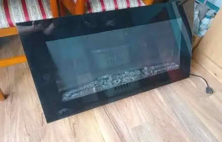 Photo of free truflame 2000 watt wall mounted fire with remote (Moor Allerton LS17) #1