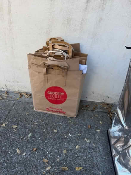 Photo of free CURB ALERT paper bags, organizers (Oakland, CA) #3