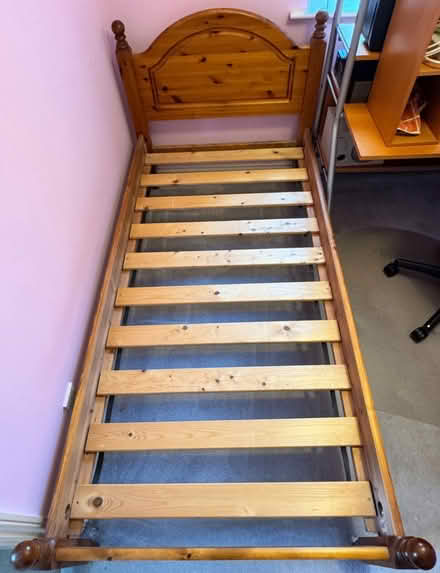 Photo of free Single pine bed with guest under bed metal trundle (Foscot OX7) #2