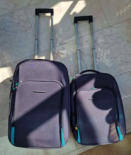 Photo of free Pair of wheeled suitcases (Great Ashby SG1) #3