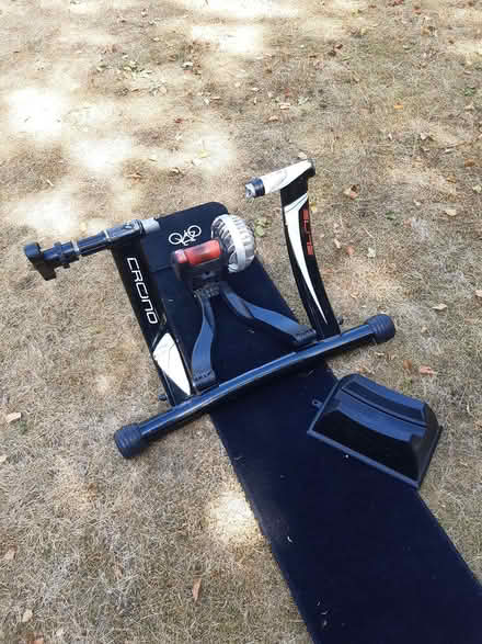 Photo of free Cycle trainer and bike wheel (Reigate RH2) #1
