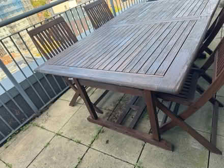 Photo of free Large outdoor table 4 chairs (NG1 Centre) #2