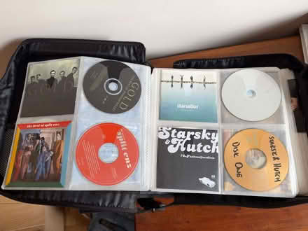 Photo of free Approx 200 mixed DVDs and CDs in Zip Cases (The Camp AL1) #3