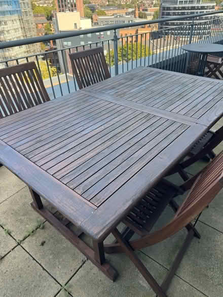 Photo of free Large outdoor table 4 chairs (NG1 Centre) #1