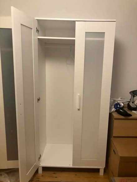 Photo of free Three white cupboards and drawers (NW63SJ) #1