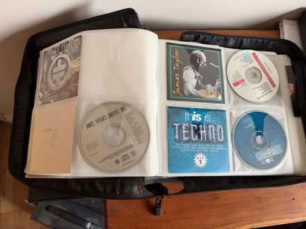 Photo of free Approx 200 mixed DVDs and CDs in Zip Cases (The Camp AL1) #4