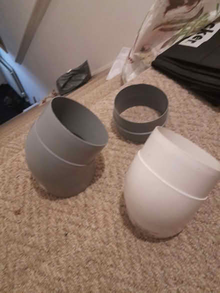 Photo of free 2 of 45 degree and 1 straight 100mm pipe coupling (Little Amwell SG13) #1