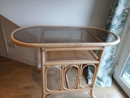 Photo of free Glasstop cane table and two chairs (no fire label ) (Ware SG12) #1
