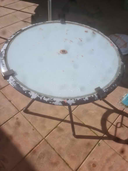 Photo of free Gareden table, glass top (Swords) #1