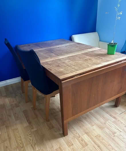 Photo of free Table fits 8-10 with 6 chairs (Davis Drive and Leslie.) #1