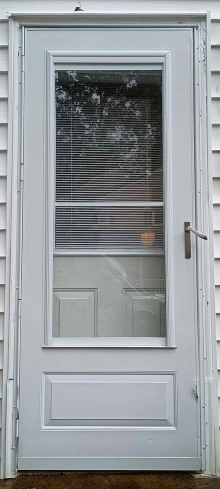 Photo of free Storm door Window, closer, handle (Prince William Cty, Manassas) #1