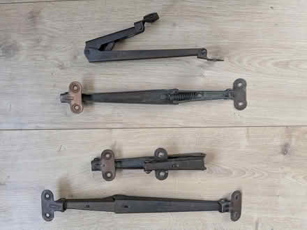 Photo of free 4 x shelf flap spring hinges (Riverhead TN13) #1