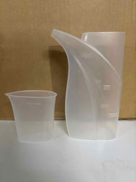 Photo of free 2 x small plastic measuring jugs (Ponteland NE20) #1
