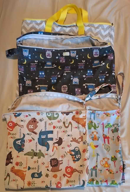 Photo of free Wet bags (please note, broken zippers (Cann Hall E7) #1