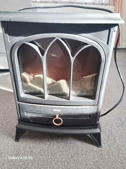 Photo of free Small black electric fire (Penrith CA11) #1