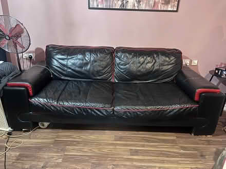 Photo of free black leather sofa (Drayton Park N7) #1