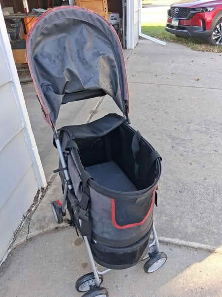 Photo of free Pet stroller (1307 Cedar St. Alex. MN, alley) #1