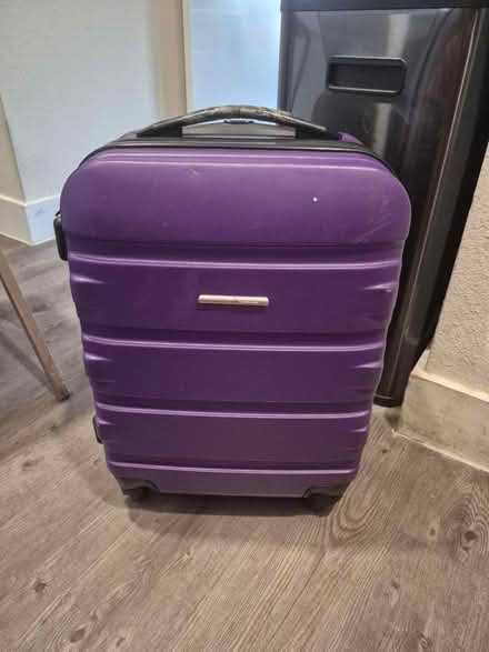 Photo of free Rolling suitcase (76102) #1