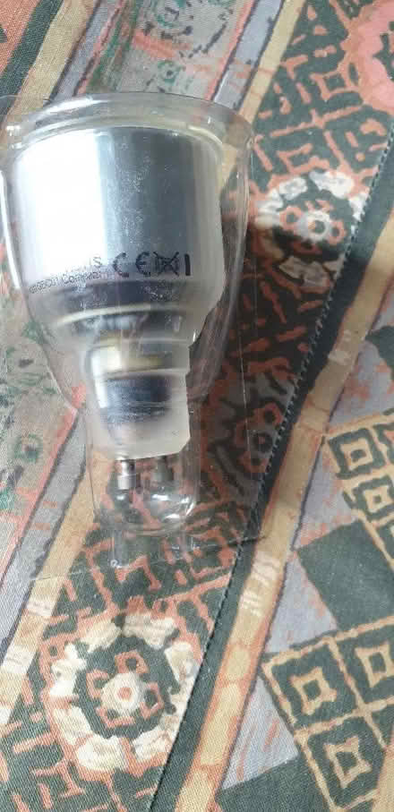 Photo of free 4 new florescent spot light bulbs. MEGAMAN. 9 WATT. Long ste (Thorpe Hamlet NR1) #1