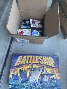 Photo of free box of CDs and board game for school kids #1