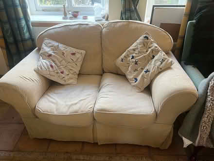 Photo of free two seater stone colour sofa (Llanfilo LD3) #1