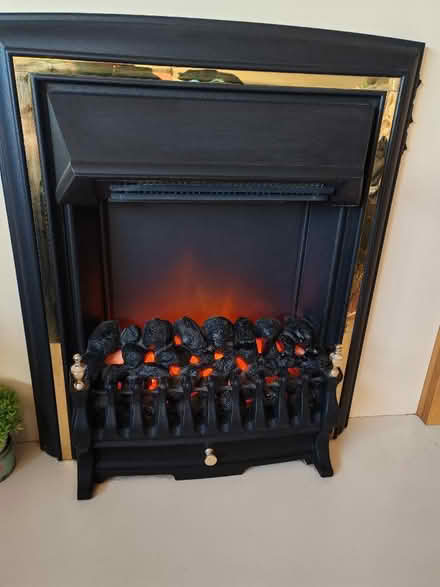 Photo of free Fan heated fire with surround (Milnthorpe LA7) #1