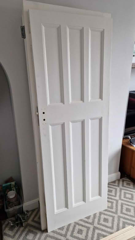 Photo of free 5 x solid pine 4 panel doors (KT3 - Motspur Park) #1