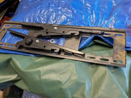 Photo of free Tilting wall TV hanger unit (Kingswood) #1