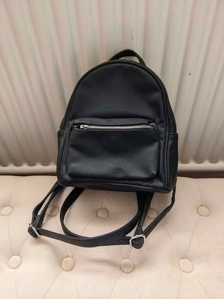 Photo of free Small black leather look backpack (Caldecott OX14) #1