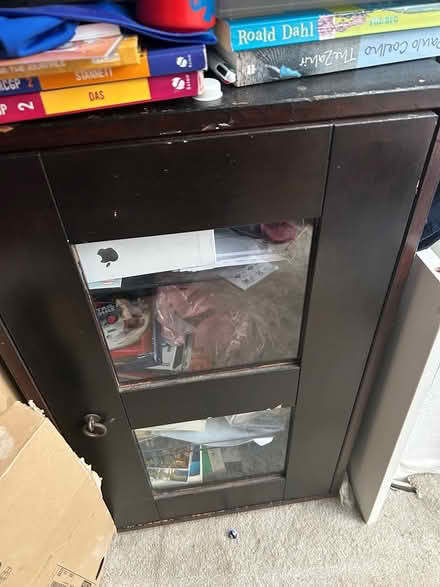 Photo of free Brown/ glass cabinet on castors (Hemel HP2) #1