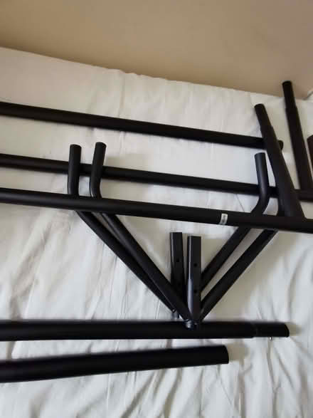 Photo of free Strong clothes rail 6 ft matte black, sturdy Very good (Beaminster DT8) #1