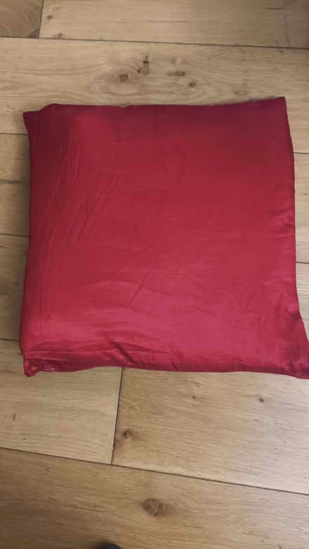 Photo of free red silky cushion GC SE25 (South Norwood SE25) #1