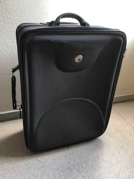 Photo of free Large black suitcase for storage (Portslade Village BN41) #1
