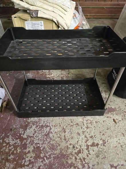 Photo of free Small black plastic shelves (Lydgate OL4) #1