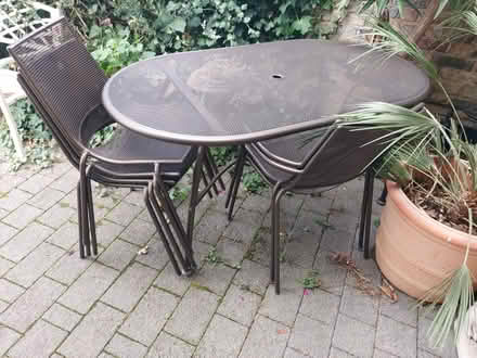 Photo of free metal table and chairs (kew tw9) #1