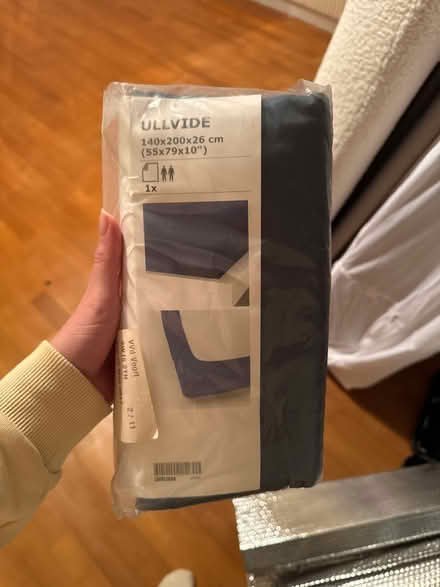 Photo of free IKEA dark blue mattress cover (Shepherds Bush W6) #1
