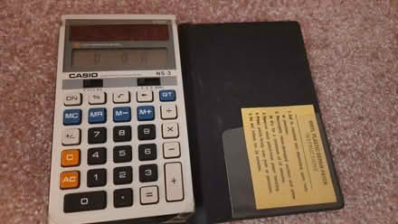 Photo of free Calculator in plastic sleeve (Byfleet KT14) #1