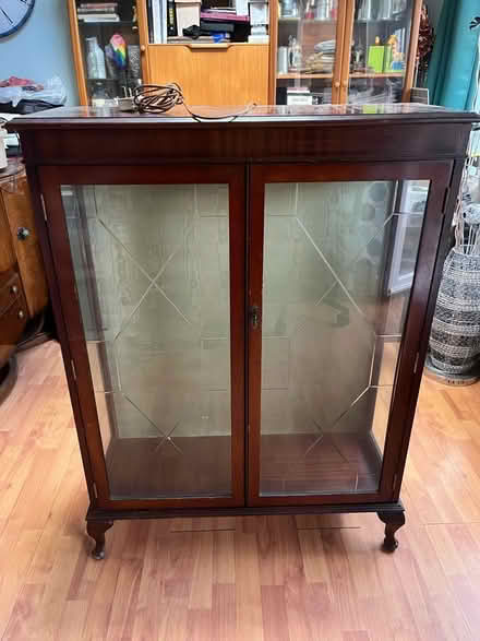 Photo of free Dark wood glass cabinet (Hertford Heath SG13) #1